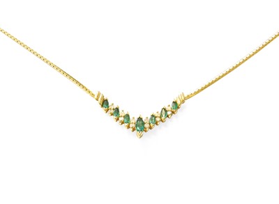 Lot 404 - An Emerald and Diamond Necklace, the central v-...