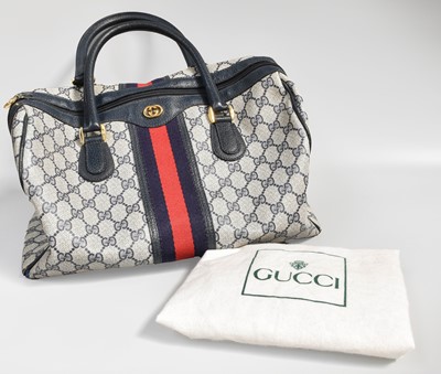 Lot 1090 - Gucci Blue Monogram Bag with blue and red...