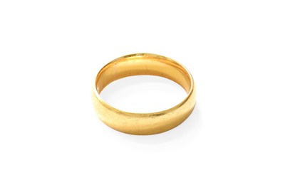 Lot 437 - A 22 Carat Gold Band Ring, finger size J