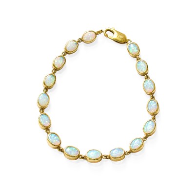 Lot 445 - A 9 Carat Gold Opal Bracelet, sixteen chain...