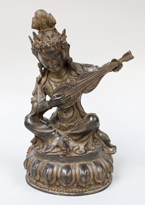 Lot 277 - A Sino Tibetan Patinated Cast Metal Sculpture,...