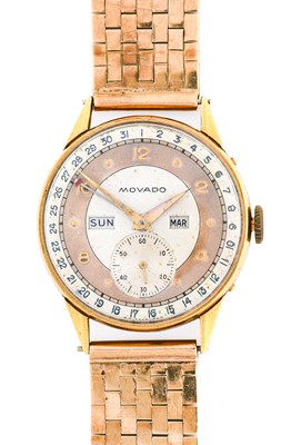 Lot 2381 - Movado: An 18 Carat Gold Triple Calendar...