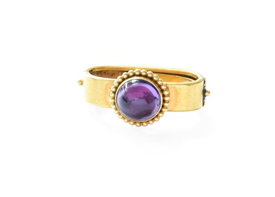 Lot 431 - An Amethyst Clip, the round cabochon amethyst...