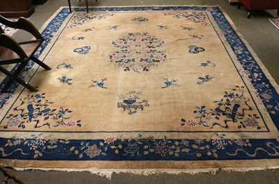 Lot 1114 - Walter Nichols Chinese Carpet, the champagne...