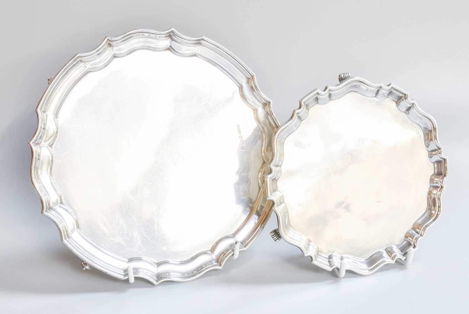 Lot 9 - A George VI and an Elizabeth II Silver Waiter,...