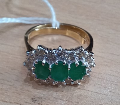 Lot 2091 - An 18 Carat Gold Emerald and Diamond Triple...