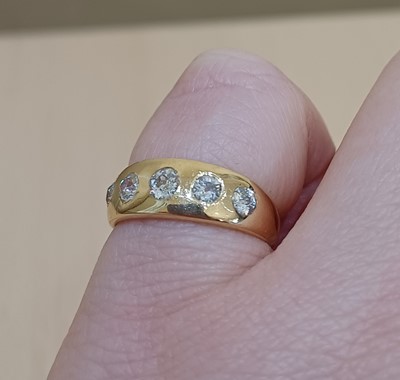 Lot 2125 - An 18 Carat Gold Diamond Five Stone Ring the...