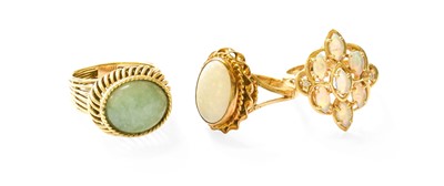 Lot 423 - A 9 Carat Gold Opal Ring, the oval cabochon...