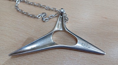 Lot 2001 - A Silver Pendant on Chain, designed by Henning...
