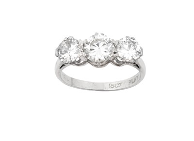 Lot 2299 - A Diamond Three Stone Ring the round brilliant...