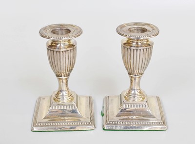 Lot 101 - A Pair of Victorian Silver Candlesticks, by...