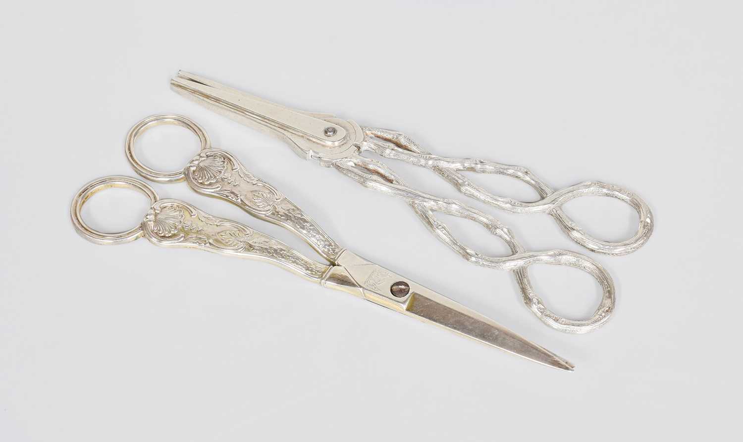 Lot 41 - A Pair of George III Silver Grape-Scissors, by...