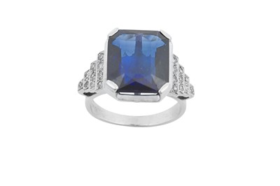 Lot 2019 - A Synthetic Sapphire and Diamond Ring the...