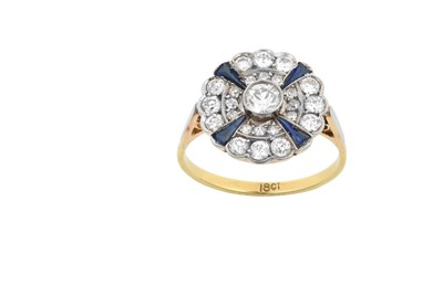 Lot 2161 - A Synthetic Sapphire and Diamond Cluster Ring...