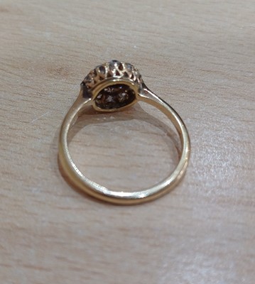 Lot 2106 - A Diamond Cluster Ring the central raised old...