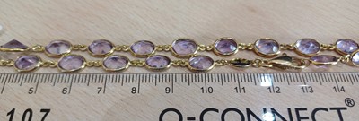 Lot 2151 - An 18 Carat Gold Amethyst Necklace the chain...