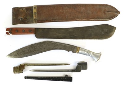 Lot 233 - A Second World War Kukri, the 32cm curved...