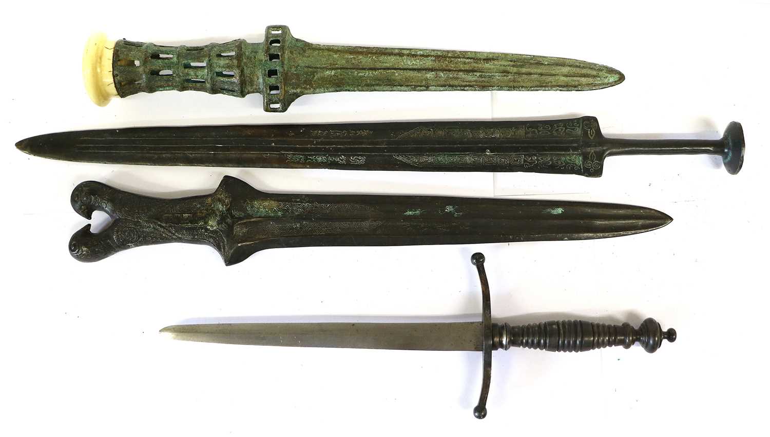 Lot 235 - Three Ancient Style Bronze Short Swords, one...