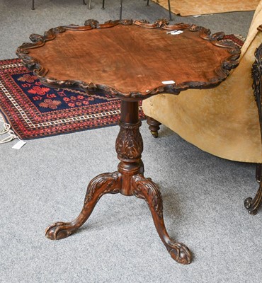 Lot 1310 - A 19th Century Carved Mahogany Tripod Table,...