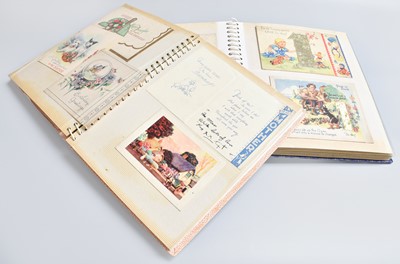 Lot 174 - Two Albums of Vintage Greeting Cards,...