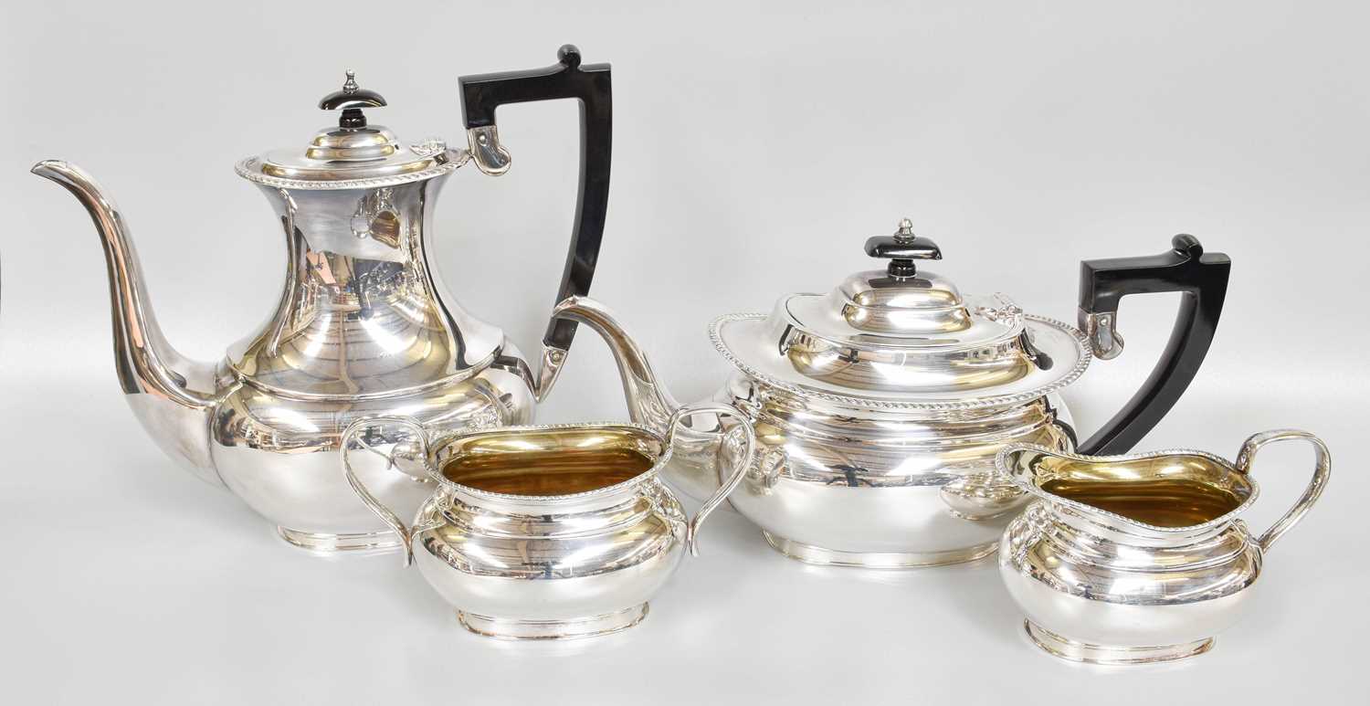 Lot 127 - A Four-Piece Elizabeth II Silver Tea and...