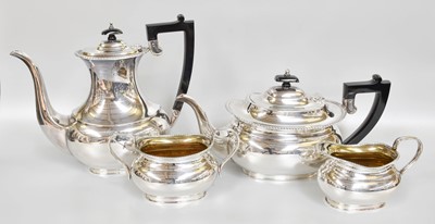 Lot 127 - A Four-Piece Elizabeth II Silver Tea and...