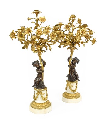 Lot 210 - A Pair of French Gilt and Patinated Bronze Six-...