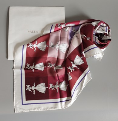 Lot 1206 - A Valentino Silk Scarf, in shades of pink, red...