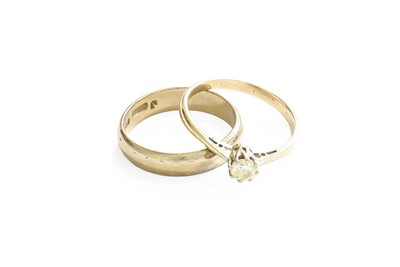 Lot 54 - An 18 Carat Gold Textured Band Ring, finger...