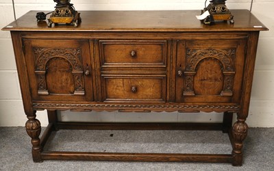 Lot 1394 - A Reproduction Oak Dresser Base, with moulded...