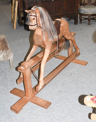 Lot 1214 - A Modern Unpainted Rocking Horse, with...