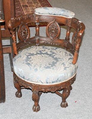 Lot 1382 - A Carved Oak Burgermeister Tub Chair