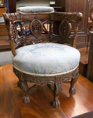 Lot 1307 - A Carved Oak Burgermeister Tub Chair