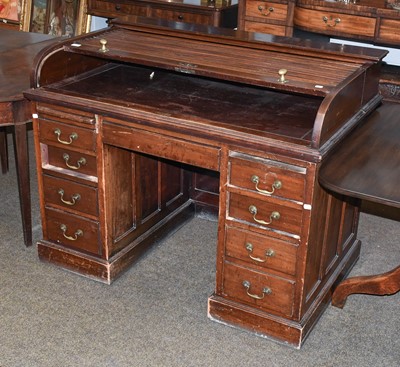 Lot 1155 - A 1920's Roll Top Pedestal Desk, by WM....