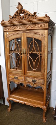 Lot 1361 - A 20th century Carved Oak Cabinet, with two...