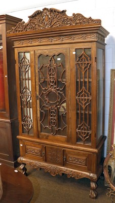 Lot 1359 - A 20th century Carved Oak Cabinet, with glazed...