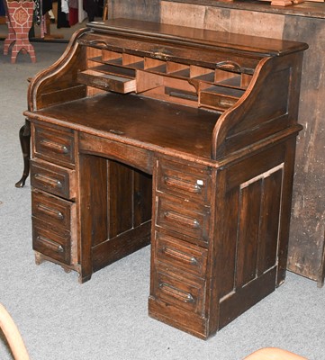 Lot 1342 - A 1920s Oak Roll Top Desk, 106cm by 66cm by 112cm