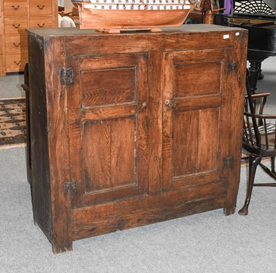 Lot 1306 - An 18th century Panelled Oak Two Door Cupboard,...