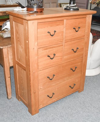 Lot 1406 - A Modern Oak Four Height Chest of Drawers,...