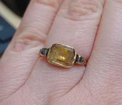 Lot 2150 - A Topaz and Diamond Ring and An Emerald and...
