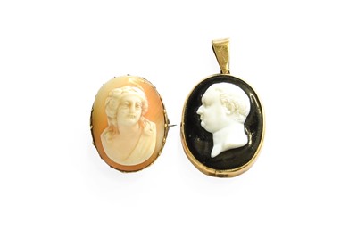 Lot 31 - A Shell Cameo Brooch, measures 2.4cm by 1.8cm;...