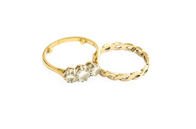 Lot 7 - An 18 Carat Gold Diamond Three Stone Ring, the...