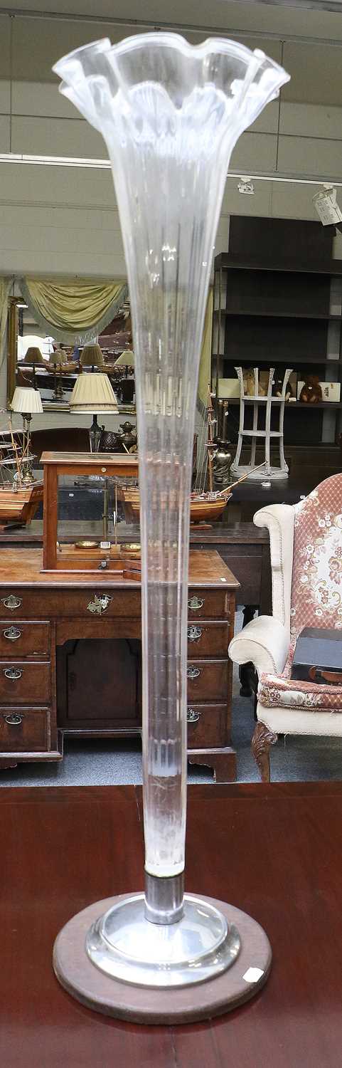 Lot 113 - A Clear Glass Floor Standing Trumpet Vase for...