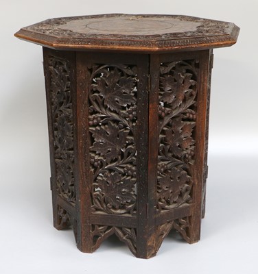 Lot 1292 - An Eastern Octagonal Brass Inlaid Hardwood...