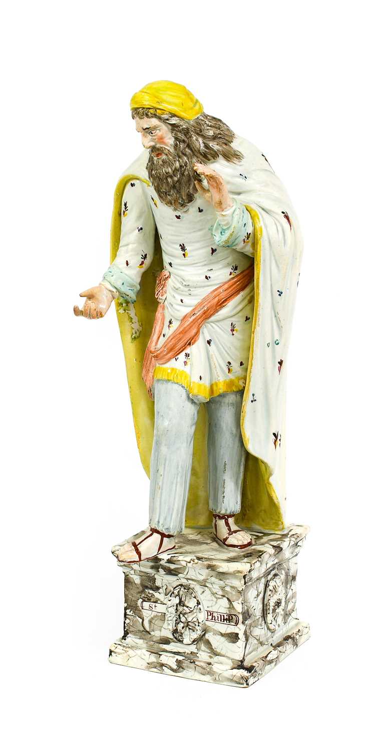 Lot 19 - A Staffordshire Pearlware Figure of St Philip,...