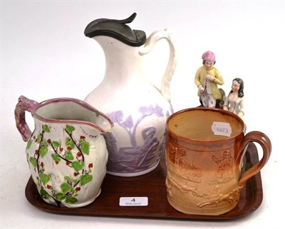 Lot 4 - Staffordshire figure group, two jugs and a stoneware mug