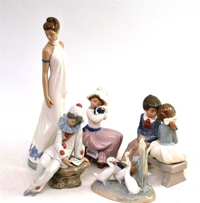 Lot 6 - Five Nao figures - a crown, geese, lady, girl with puppy and a boy and girl on a bench