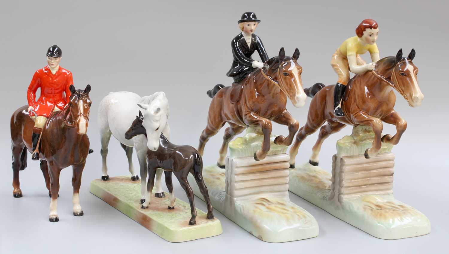 Lot 166 - Beswick Horse Groups, comprising: Mare and...