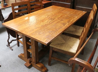 Lot 1297 - A Mango Wood Table with Trestle Base and Four...