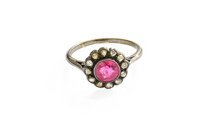 Lot 71 - A Synthetic Ruby and Diamond Cluster Ring, the...